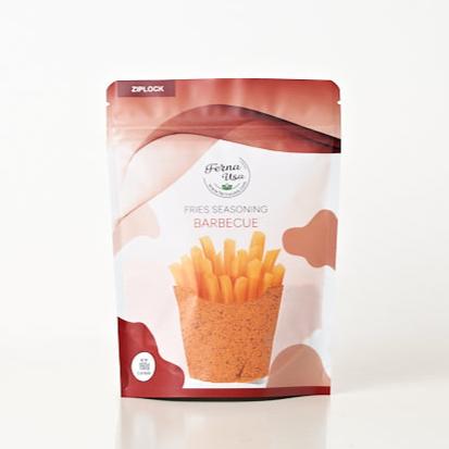 160 grams stand-up pouch packaging with zip lock of FERNA USA Fries Seasoning Barbecue Flavor. The front displays an illustration of french fries and a transparent part of the packaging that makes the powder seasoning visible for the customer to see.